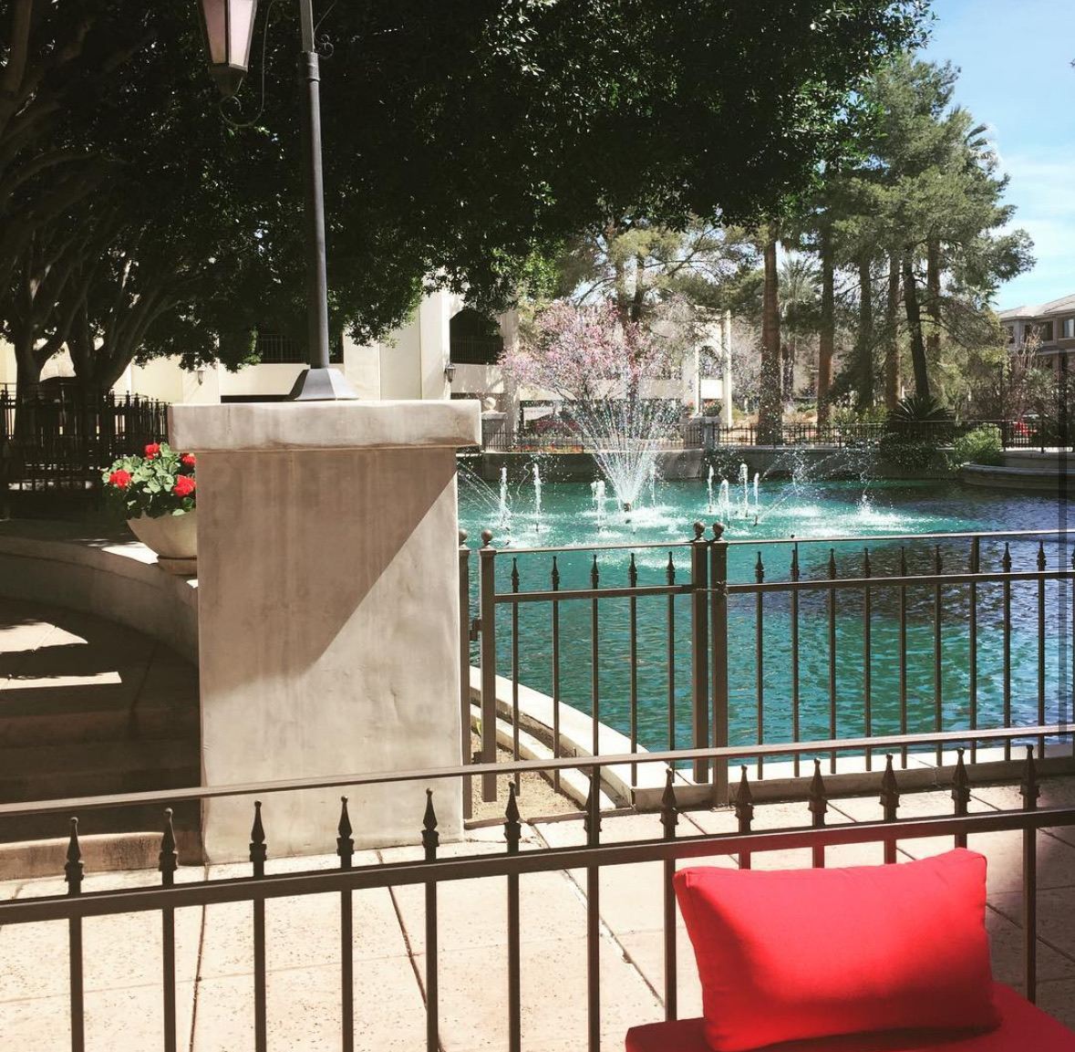 The patio at Redz Urban Table looking out over a fountain and pond